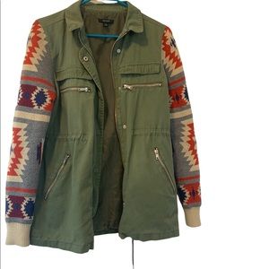 Quinn  jacket with knit sleeves.